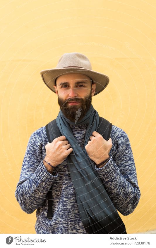 Tourist at yellow wall Man Backpack Wall (building) Yellow Youth (Young adults) Vacation & Travel Tourism Human being Guy Trip bearded Hat handsome