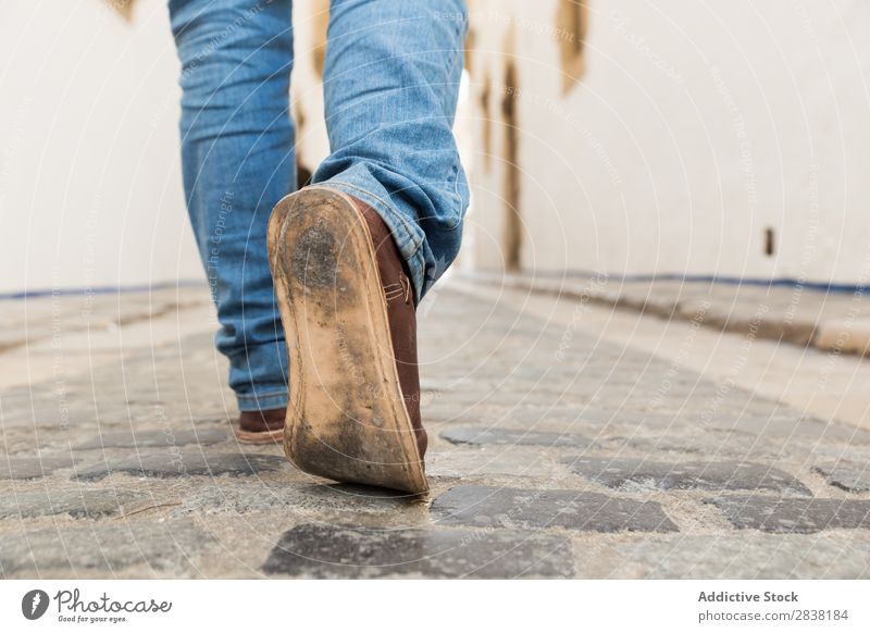 Man stepping on a road Legs Street Human being Footwear grungy Old Walking Feet Town Lanes & trails Movement Tourist Vacation & Travel Tourism Hiking Action