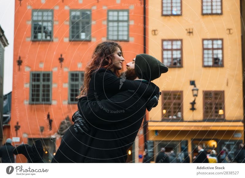 Man posing with girlfriend on street Couple Street Happy City Carrying Human being Vacation & Travel Tourism Love Happiness Relationship Cheerful