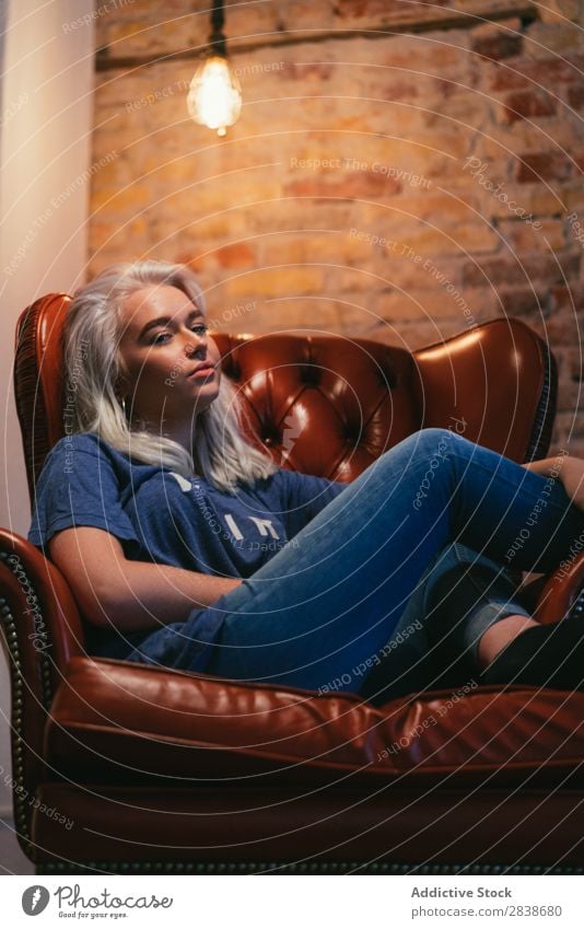 Blonde woman in armchair Woman pretty Home Youth (Young adults) Armchair Sit Resting Cozy Beautiful Lifestyle Beauty Photography Attractive Portrait photograph