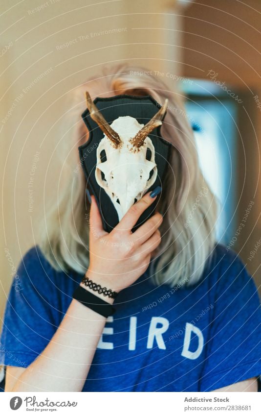 Woman closing face with skull pretty Home Youth (Young adults) Blonde Death's head Animal Decoration horns Posture Beautiful Lifestyle Beauty Photography