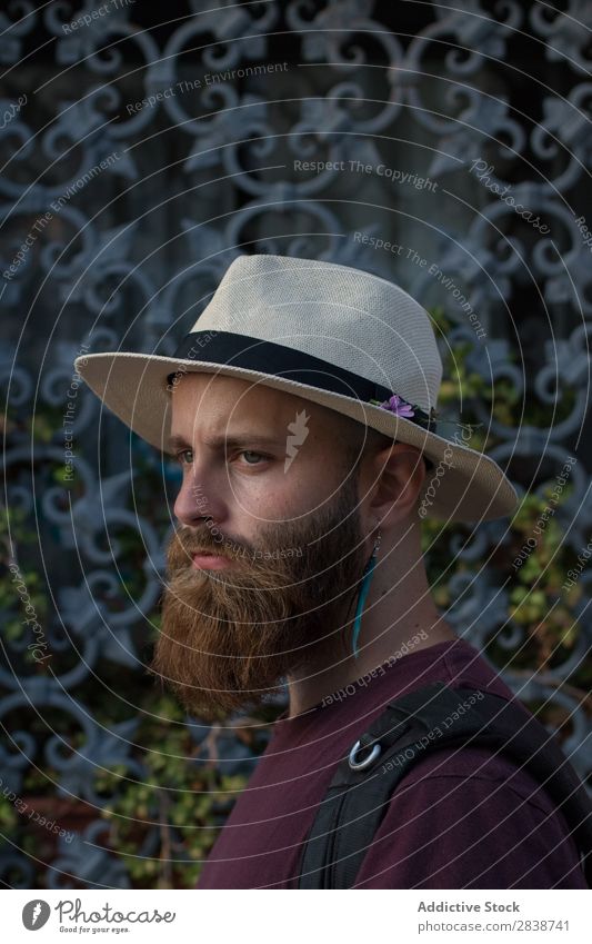 Portrait of bearded man with earring Man Brutal Earring brutality Masculine Lifestyle decor traveler Model Youth (Young adults) handsome Fashion Beard