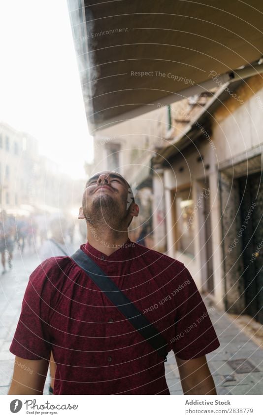 Smiling man posing on the street Man traveler Square romantic Town Tourist Happiness Cheerful Tourism Youth (Young adults) Natural Old City Vacation & Travel