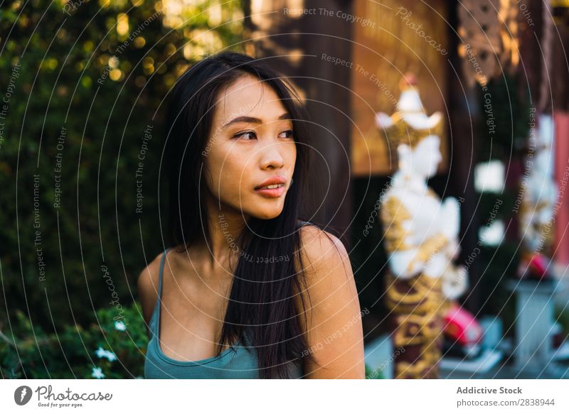 Cheerful woman posing on street Woman pretty asian Youth (Young adults) Happy Joy Street Green Town Beautiful Portrait photograph Attractive Beauty Photography