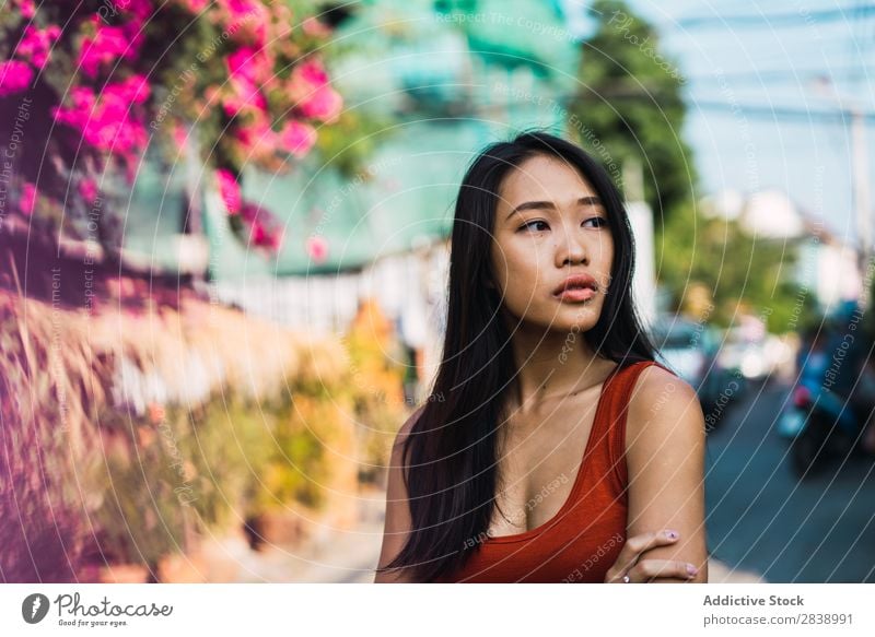 Cheerful woman posing on street Woman pretty asian Youth (Young adults) Happy Joy Street Green Town Beautiful Portrait photograph Attractive Beauty Photography