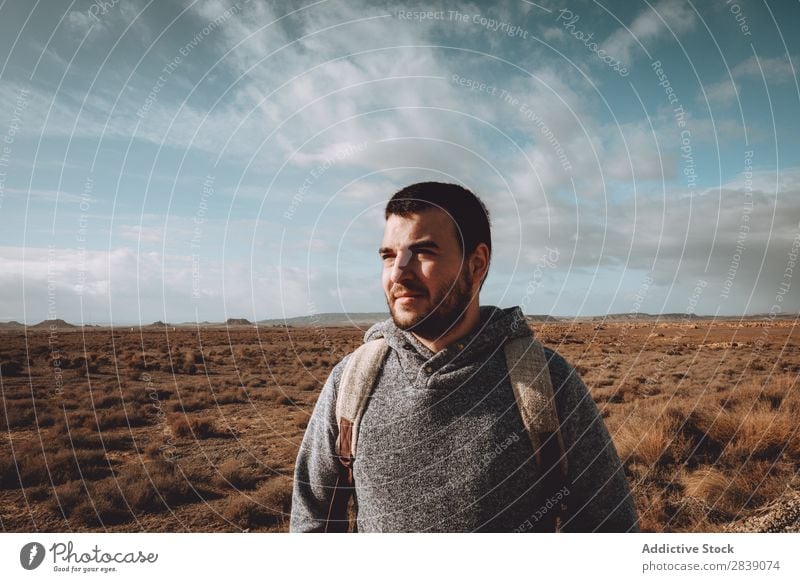 Man standing in dry grass Human being Tourist Nature Landscape Height Grass Landing Ground Environment Vacation & Travel Tourism Yellow Stone Wilderness