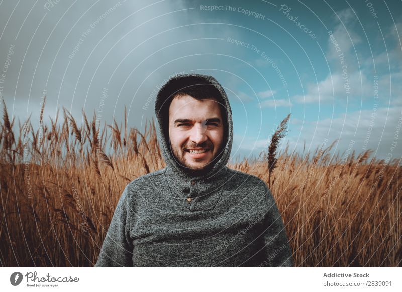 Man standing in dry grass Human being Tourist Nature Landscape Height Grass Landing Ground Environment Vacation & Travel Tourism Yellow Stone Wilderness