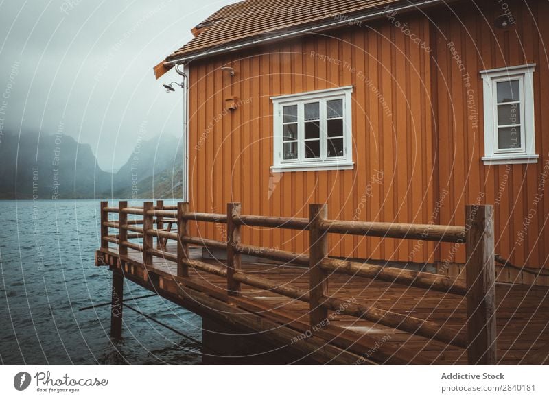 Typical norwegian cabin in Reine, Lofote, Norway Landscape Water Mountain lofoten Scandinavia Ocean Sunset Nordic Fjord Coast Fishery Nature North