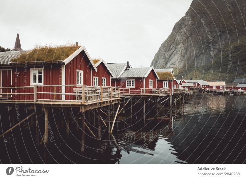 Small houses on lakeside in mountains House (Residential Structure) Range Lake Mountain Landscape Rural Reflection Settlement Village Nature Vantage point