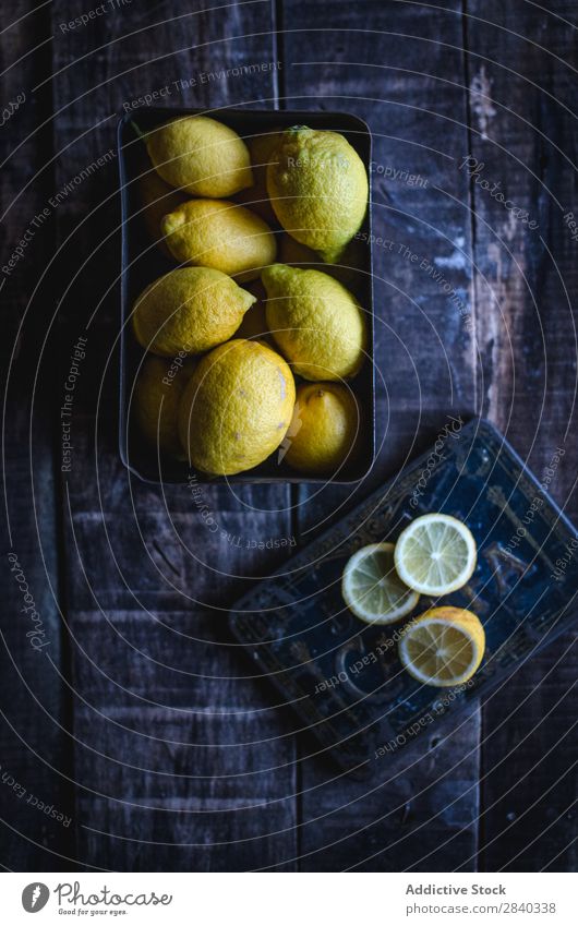 Tasty lemons on wooden table Lemon Fresh Fruit Food Healthy citrus Yellow Sweet Organic Mature Juicy Slice Vitamin Natural Vegetarian diet Ingredients Tropical