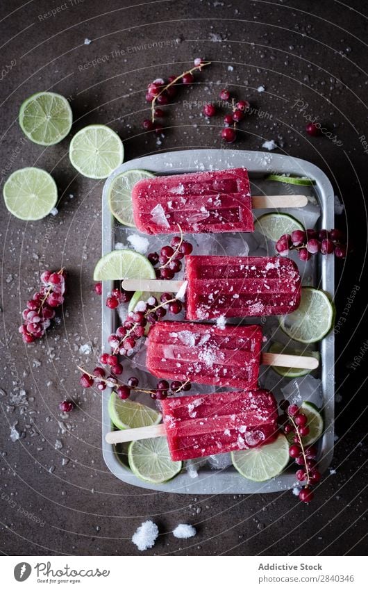 From above popsicke in container Ice cream Home-made Sweet Food Dessert Cold popsickes Lime Berries Frozen Gourmet Delicious Refreshment flavor Fresh Sorbet