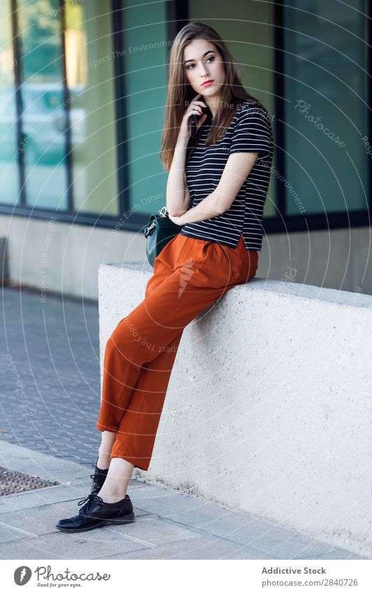 Portrait of beautiful young woman posing in the street. Girl Fashion Model Town Youth (Young adults) Style Easygoing Street Caucasian Portrait photograph