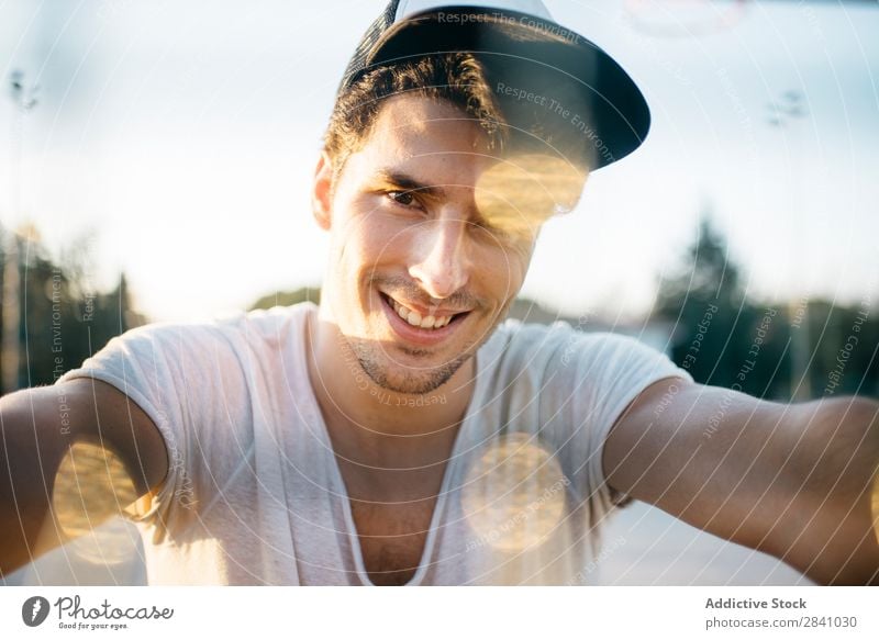 Chico Parkour Man Grid Smiling Cheerful Happy Looking into the camera Cool (slang) Posture Sunset Human being Walking Self-confident handsome Town