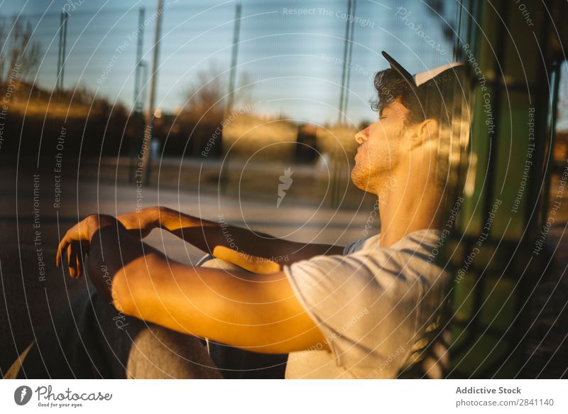 Chico Parkour Man Sit Grid Self-confident Town Cool (slang) Athletic Portrait photograph Youth (Young adults) Fashion Style Modern handsome White Easygoing