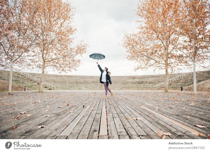 Young boy in the park Adults Autumn Attractive Background picture Boy (child) Brunette Easygoing Cool (slang) Cute Fashion Expression Expressive Flower Guy