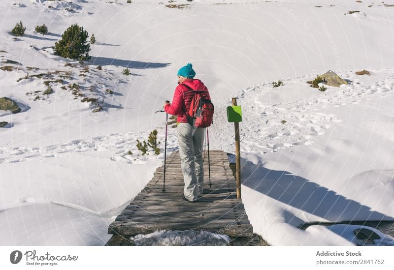 female hiker going up a mountain with snow. Action Adventure Backpack Climbing Extreme Hiking Ice Landscape Man Mountain Mountaineering Nature Exterior shot