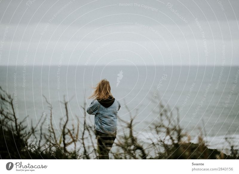 Rear view of young man with long hair Lifestyle Style Vacation & Travel Adventure Freedom Ocean Waves Young man Youth (Young adults) Man Adults 1 Human being