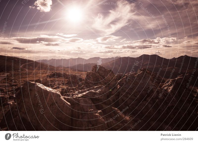 Hard Sun Environment Nature Landscape Elements Earth Air Sky Clouds Sunrise Sunset Sunlight Climate Weather Beautiful weather Wind Rock Mountain Peak Gloomy