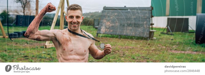 Male athlete showing medal after race Happy Feasts & Celebrations Sports Award ceremony Success Internet Human being Man Adults Smiling Strong Competition