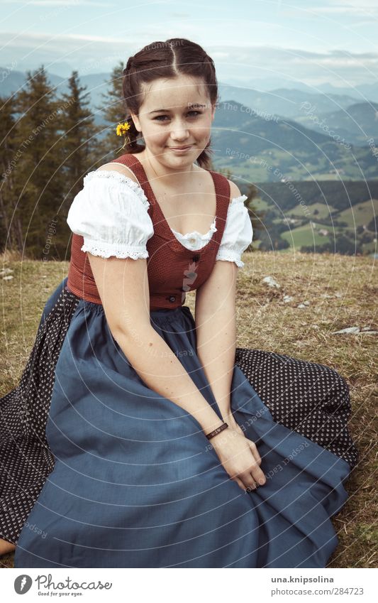 The innocence of the land Girl Young woman Youth (Young adults) 1 Human being 13 - 18 years Child Nature Landscape Meadow Alps Mountain Peak Dress