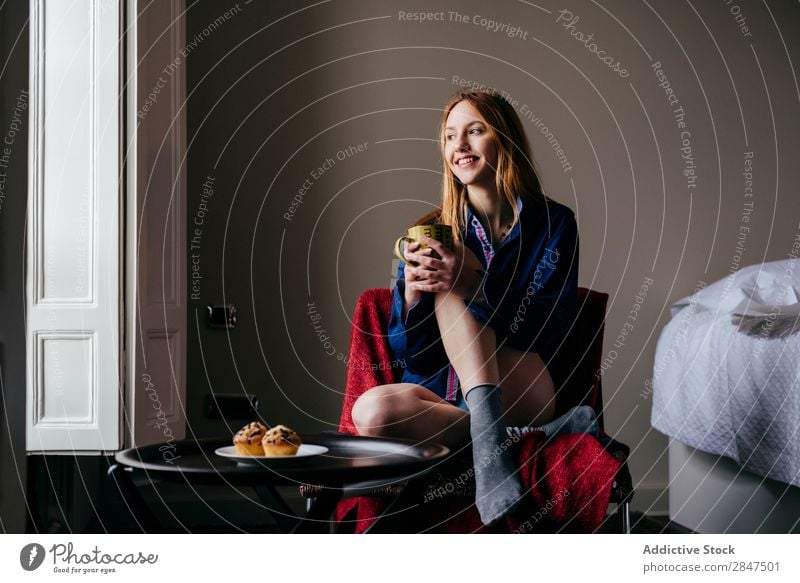 Pensive woman in armchair Woman Home Youth (Young adults) Beautiful Considerate Armchair pretty Beauty Photography Happy Human being Room Cute To enjoy