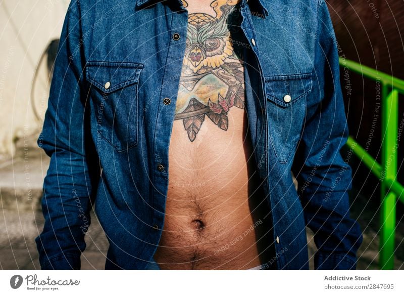 Crop male torso with tattoo Man Torso Tattoo Hipster Uniqueness Modern Model Body Town Hip & trendy millennial Tattooed Summer Chest Denim Shirt Style City