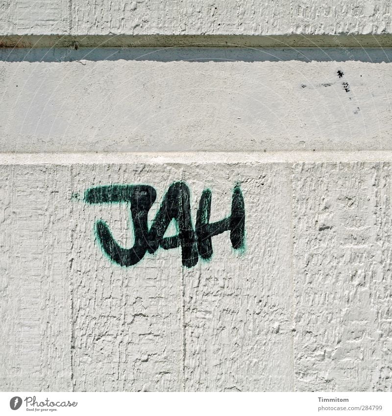 What? Wall (barrier) Wall (building) Concrete Characters Simple Gray Black clear Information Furrow Colour photo Exterior shot Deserted Copy Space bottom Day