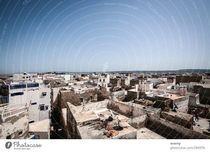 Moroccan roofs Small Town Port City Old town Deserted House (Residential Structure) Hut Architecture Facade Balcony Terrace Roof Exotic Cold Blue Gray