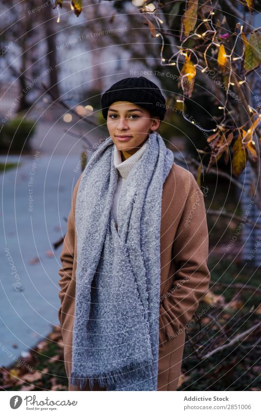 Woman posing near tree with lights Light Beautiful Youth (Young adults) Portrait photograph Human being Tree Easygoing pretty Leisure and hobbies Cute Joy