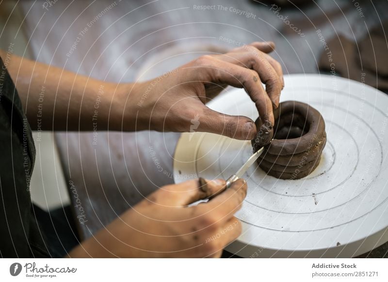 Crop woman working with clay Woman Clay Workshop shaping instrument Craftsman handwork Wheel Artisan Employees &amp; Colleagues Handcrafts ceramic Raw