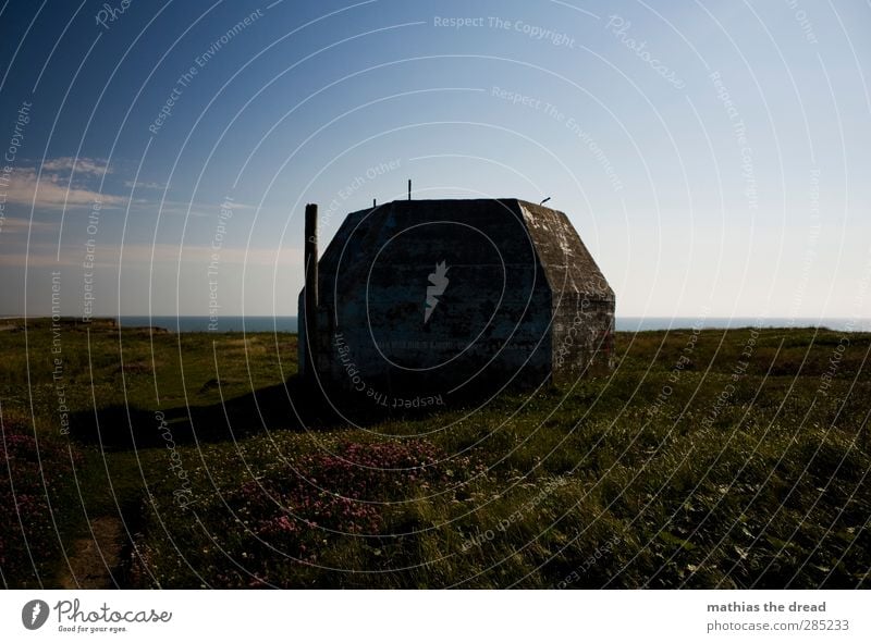 bunkers Environment Nature Landscape Air Water Sky Clouds Horizon Grass Meadow Coast Old Exceptional Threat Dark Sharp-edged Cold War Dugout Tower Flower meadow