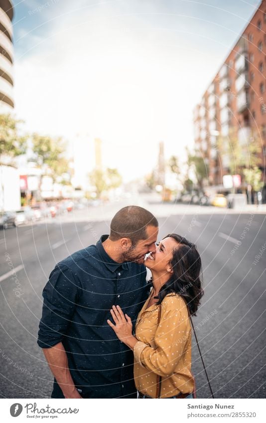 Smiling couple of lovers having fun. Woman Date Love Embrace Kissing Man Girl Youth (Young adults) Romance Couple City Happiness Happy Human being Together