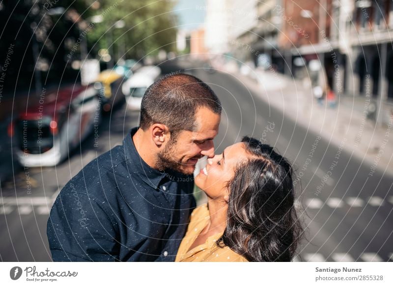 Smiling couple of lovers having fun. Woman Date Love Embrace Kissing Man Girl Youth (Young adults) Romance Couple City Happiness Happy Human being Together