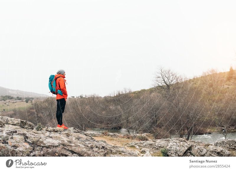 Young Backpacker enjoying of Nature. Hiking hiker trekking alpininsm Mountaineer Walking Expedition Youth (Young adults) Sports Vacation & Travel Man