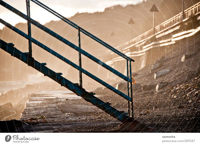 ascent Coast Stairs Swimming & Bathing Old Wet Ocean Levee Lakeside Bank reinforcement Sea promenade Promenade Banister Go up White crest Damp Air Dusk Sunset