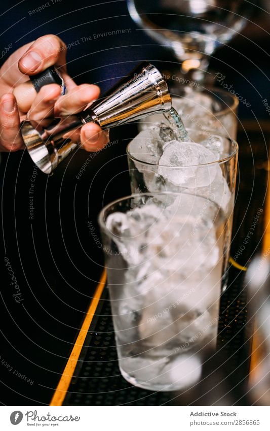 Barman preparing cocktails in pub Alcoholic drinks Background picture barman bartender Beverage Bourbon Cocktail Drinking Food Fresh garnish Gin Glass Juice