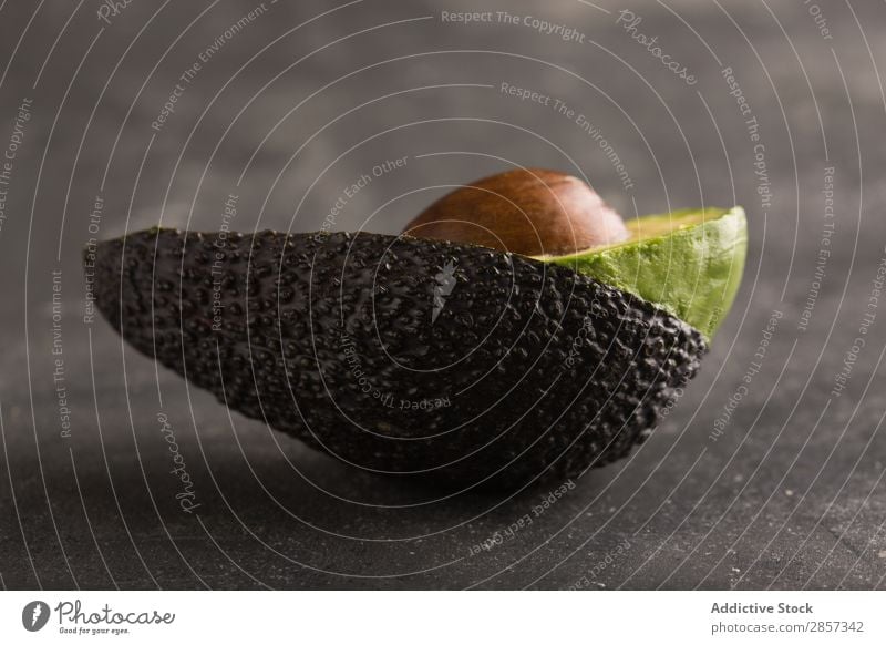 Sliced avocado on dark background Arrangement Avocado Chile cilantro Coriander Delicious Dip Exotic Food Fruit Green guacamole Healthy Ingredients Natural