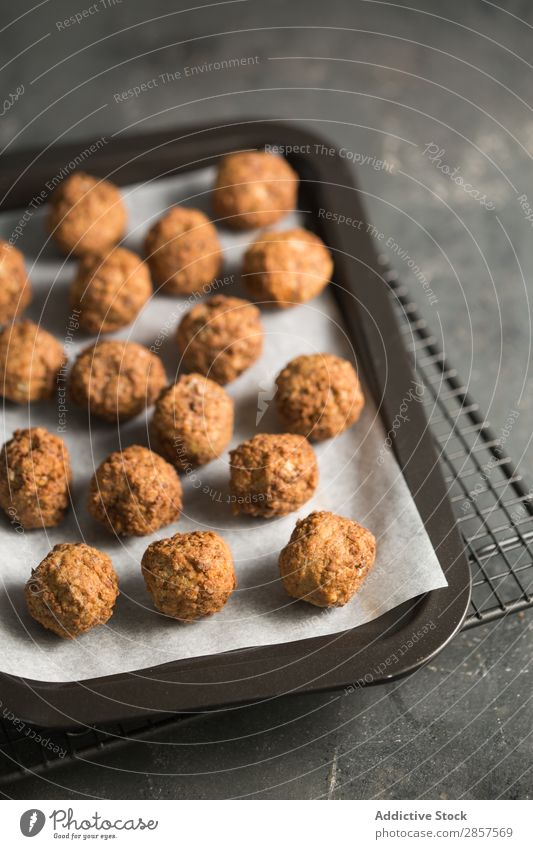 Homemade meatballs in oven tray Ball Beef Cooking Delicious To feed Food Gourmet Home-made Ingredients Italian Lunch Meal Meat minced Sauce Tomato Tradition