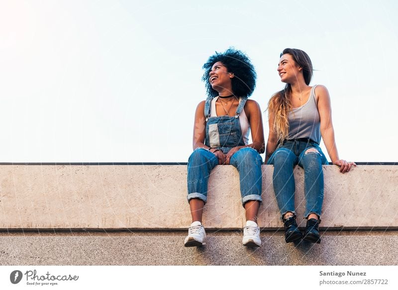 Beautiful women having fun in the street. Woman Friendship Youth (Young adults) Happy Summer Human being Joy Sit Adults Girl pretty 2 Couple Homosexual Together