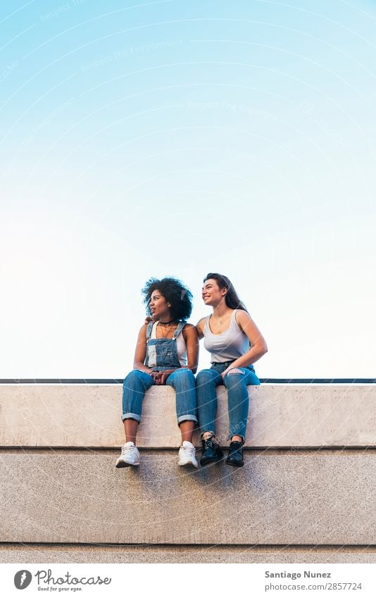 Beautiful women having fun in the street. Woman Friendship Youth (Young adults) Happy Summer Human being Joy Sit Adults Girl pretty 2 Couple Homosexual Together