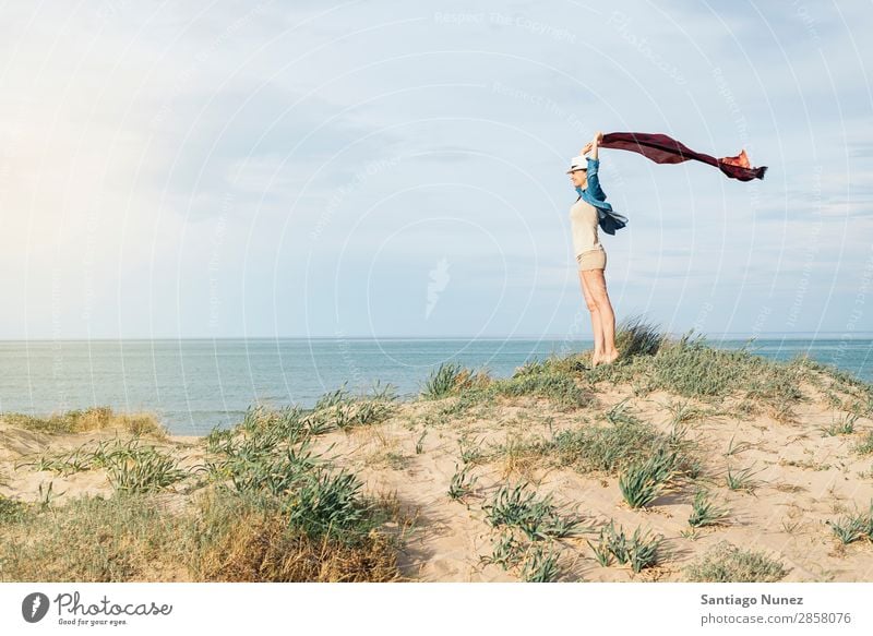 Woman walking away on the idylic beach. Beach Looking Ocean Vacation & Travel White Sun Summer Tourist Water Youth (Young adults) Relaxation Girl Caucasian