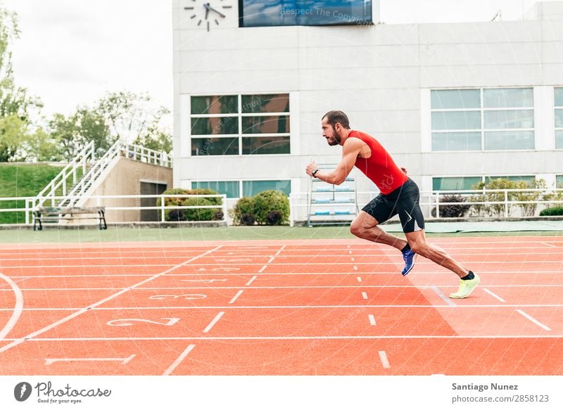 Runner ready to run is ready to run Action Athlete checking Equipment Practice Field Athletic Fitness Hand handsome Healthy Heart Jogger Legs Lifestyle Looking