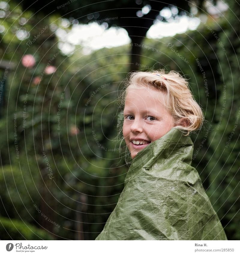 Catwalk II Playing Girl 1 Human being 8 - 13 years Child Infancy Garden Hair and hairstyles Blonde Smiling Authentic Beautiful Cute Green Joy Creativity