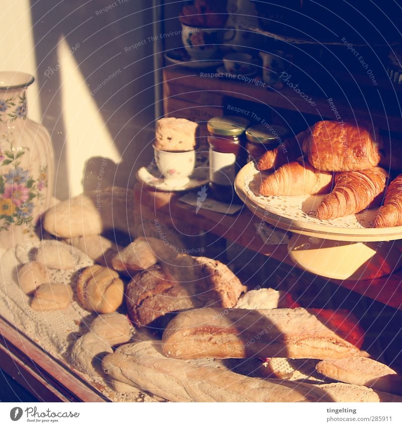 Fine. Food Dough Baked goods Bread Candy Jam Eating Breakfast Window Fragrance Authentic Delicious Brown Yellow Gold Shop window Croissant Store premises Bakery