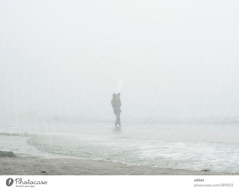 fog Summer vacation Beach Ocean Waves Aquatics Swimming & Bathing Child Man Adults Father Body 2 Human being Clouds Bad weather Fog Rain Coast Freeze