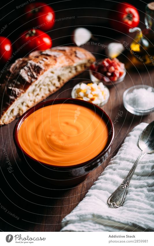 Typical spanish salmorejo Bread gazpacho Tomato Cream Soup Food Olive oil Spoon Table Wood Vegetable Egg jamon Ham Characteristic Spanish Cloth Garlic Natural