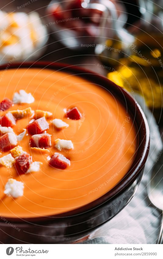 Typical spanish salmorejo Bread gazpacho Tomato Cream Soup Food Olive oil Spoon Table Wood Vegetable Egg jamon Ham Characteristic Spanish Cloth Garlic Natural