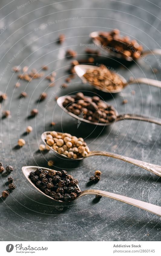 Spices on spoons Aromatic Background picture Clove condiment Copy Space Coriander Cumin Dark Dry flat lay Food Bird's-eye view Ingredients Natural Pepper Retro