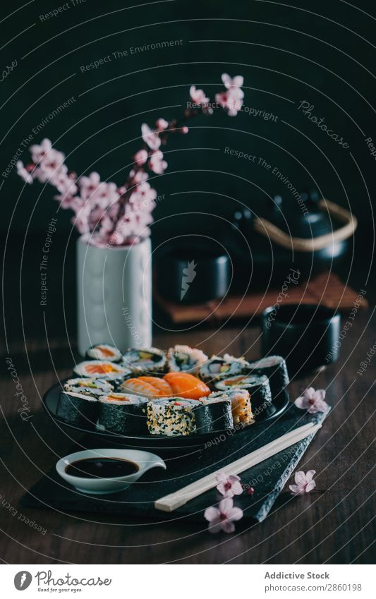 Sushi served on blackboard asian Avocado Chopstick Dish Fish Flower Food Ginger Japanese maki nigiri nori Raw Rice Salmon sashimi Seafood Smoked salmon