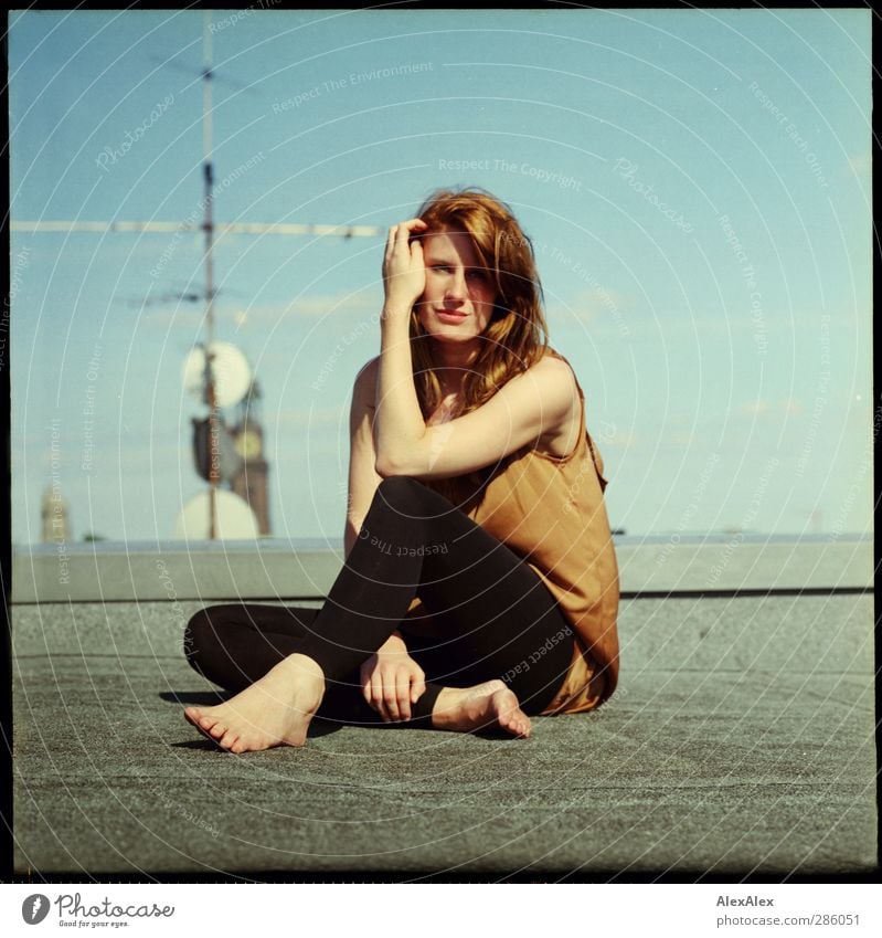 woman fox on a high seat Hair and hairstyles Young woman Youth (Young adults) Body Legs Feet 18 - 30 years Adults Cloudless sky Town Wall (barrier)